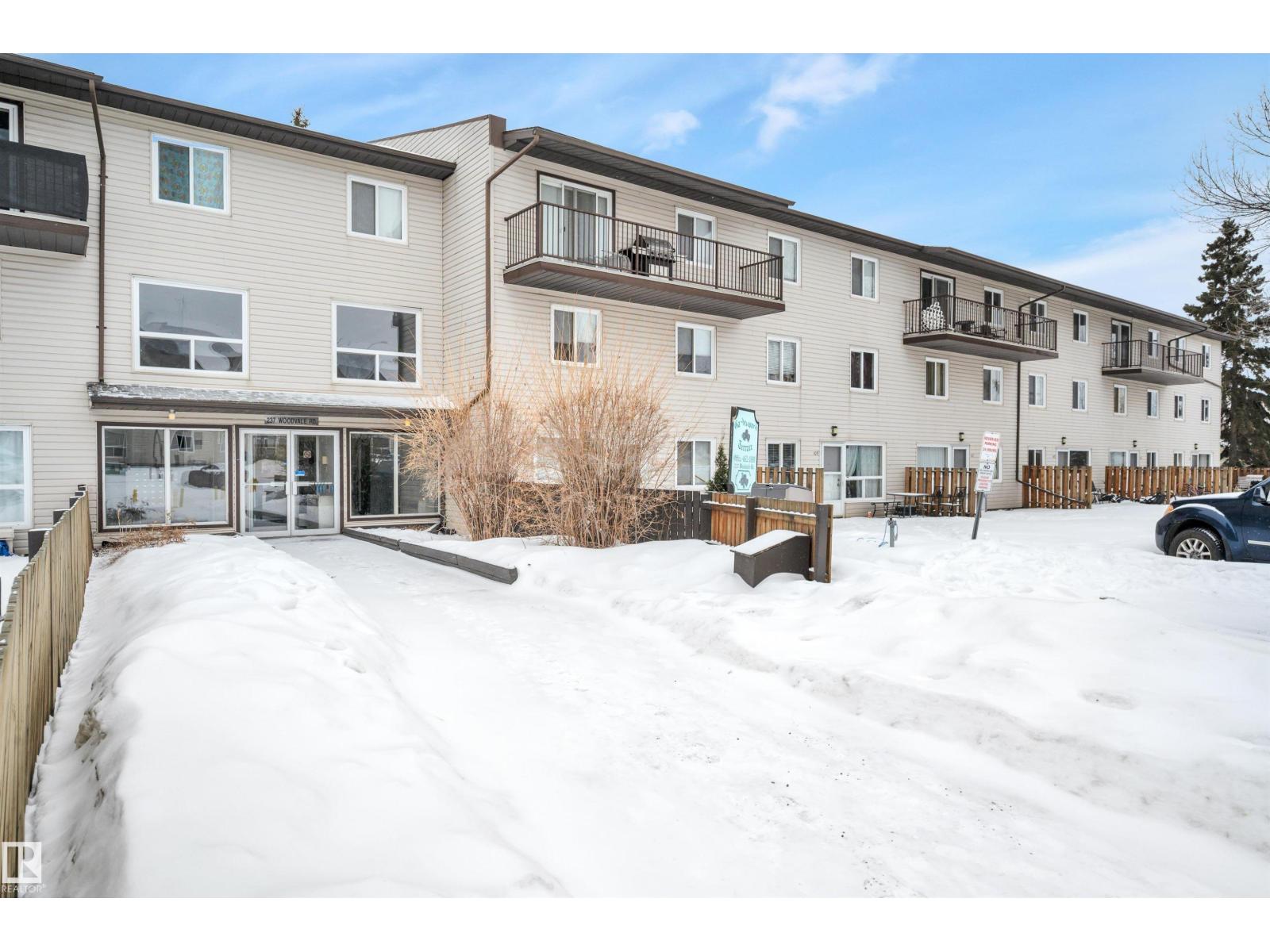 #201 237 WOODVALE RD W NW - 1