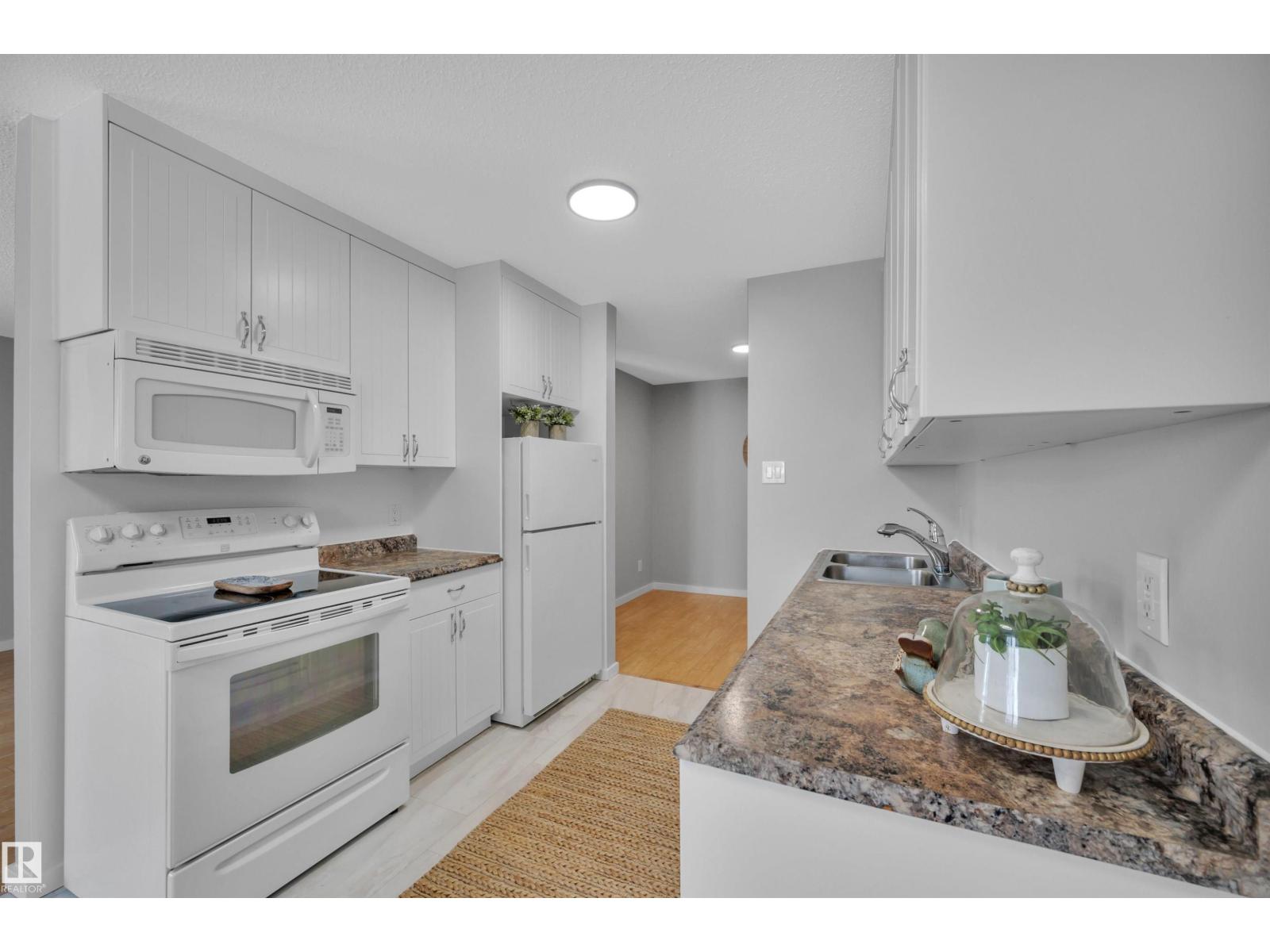 
          201 237 WOODVALE RD W NW
            <br/>
            <span>Edmonton</span>
            , 
            <span>AB</span>
             <span>T6L1E5</span>
         - Photo 29