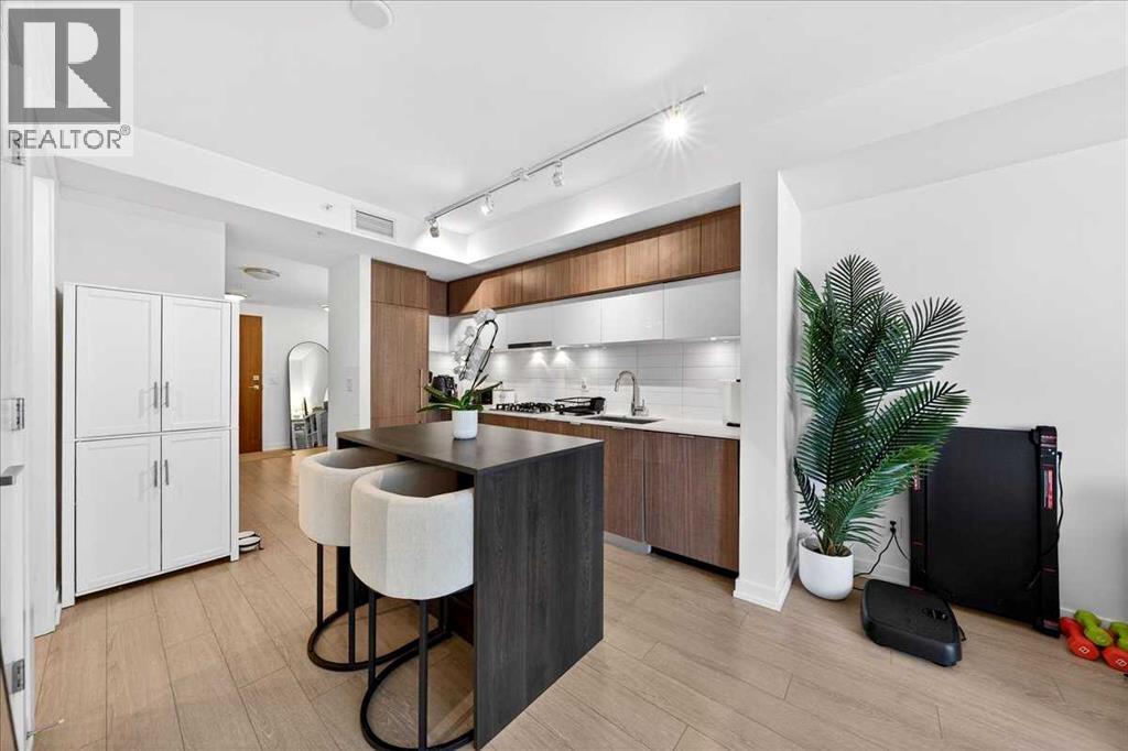 Single Family House for Sale in   Waterfront Mews SW Chinatown Calgary 