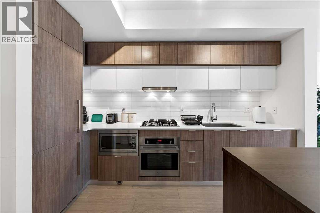 Single Family House for Sale in   Waterfront Mews SW Chinatown Calgary 