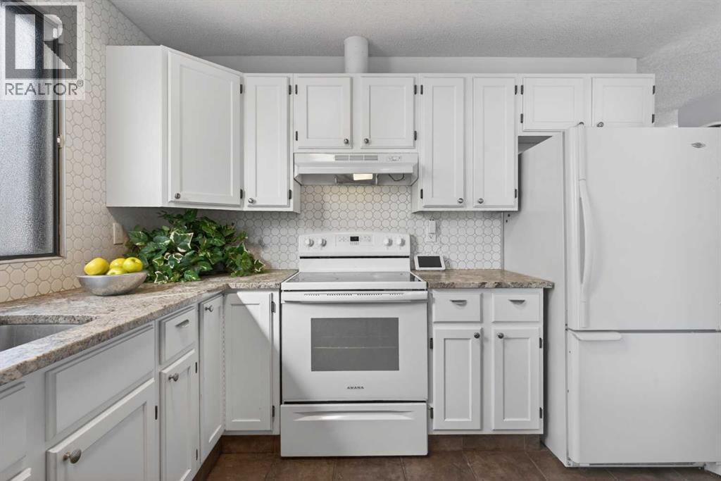 Single Family House 4 Level for Sale in  Ranchview Drive NW Ranchlands Calgary 