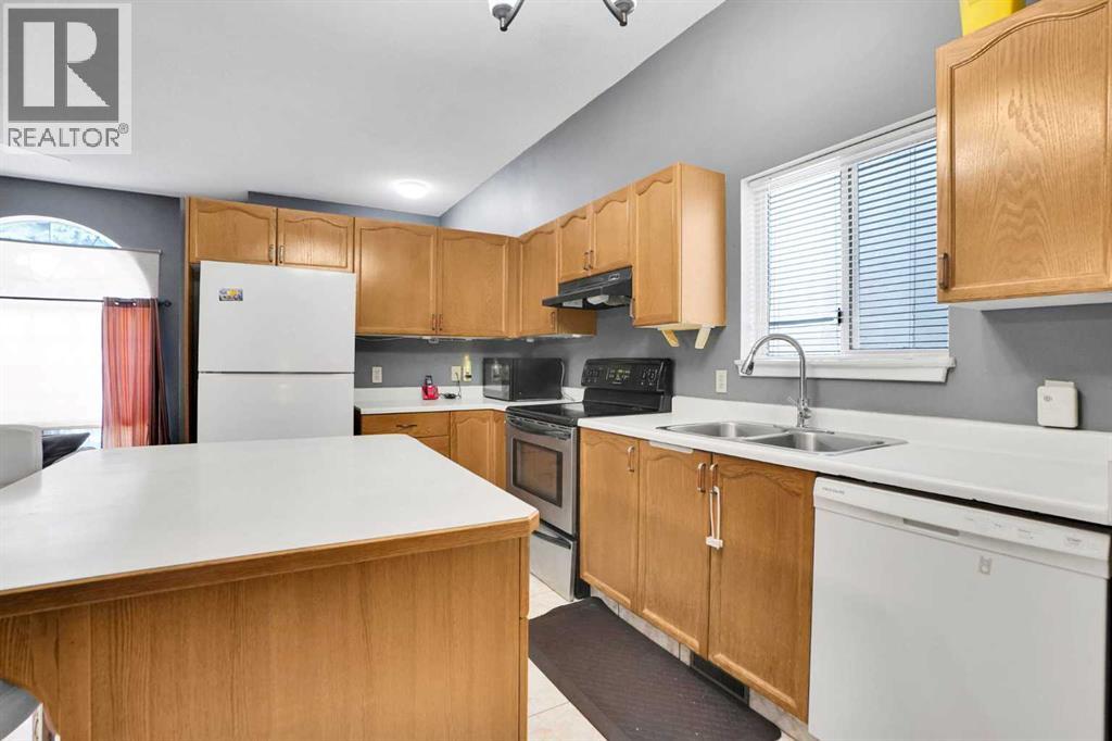 Single Family House 4 Level for Sale in  Laguna Way NE Monterey Park Calgary 