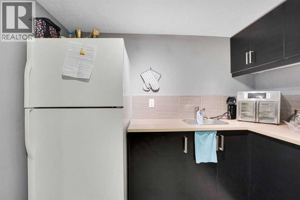 Single Family House 4 Level for Sale in  Laguna Way NE Monterey Park Calgary 