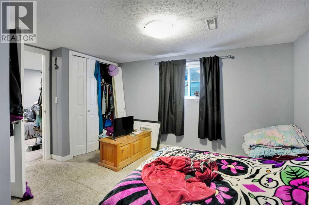 Single Family House 4 Level for Sale in  Laguna Way NE Monterey Park Calgary 