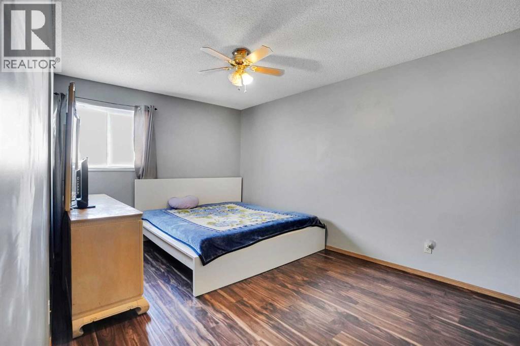 Single Family House 4 Level for Sale in  Laguna Way NE Monterey Park Calgary 