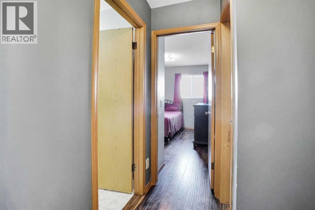 Single Family House 4 Level for Sale in  Laguna Way NE Monterey Park Calgary 