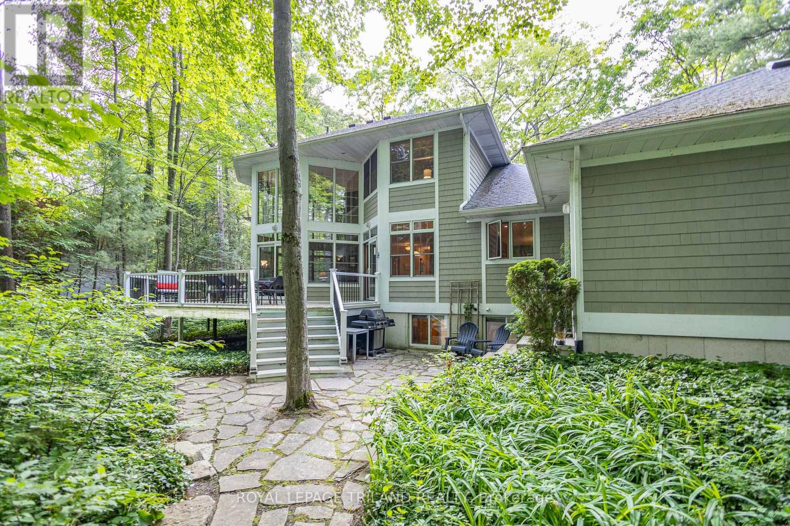 Excellent patio to backyard deck w/ low maint.