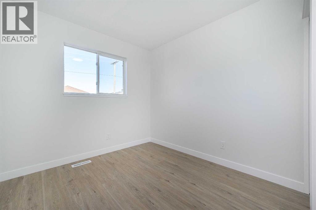 Single Family House Bi-level for Sale in  Catalina Boulevard NE Monterey Park Calgary 