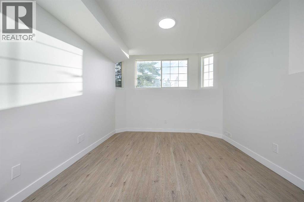 Single Family House Bi-level for Sale in  Catalina Boulevard NE Monterey Park Calgary 