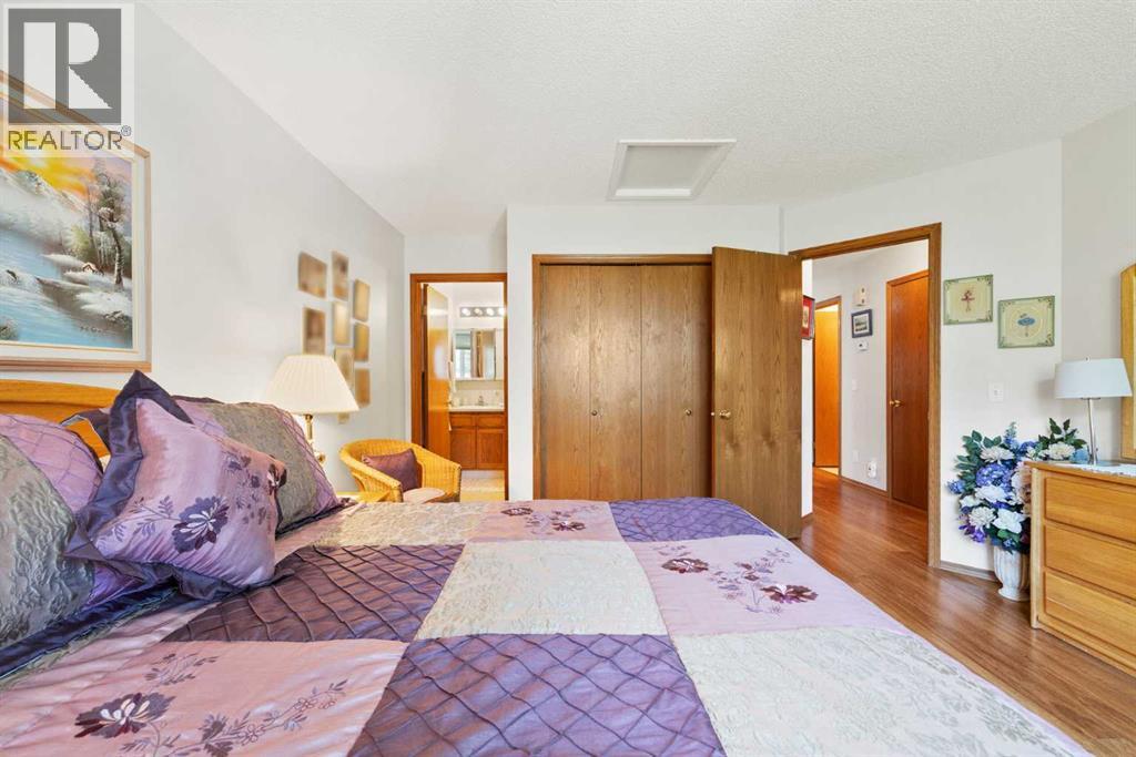 Single Family House Bungalow for Sale in  Arbour Cliff Close NW Arbour Lake Calgary 