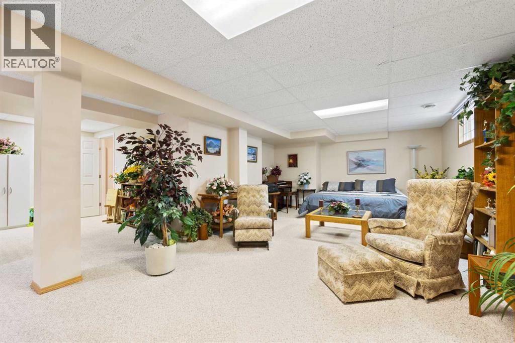 Single Family House Bungalow for Sale in  Arbour Cliff Close NW Arbour Lake Calgary 