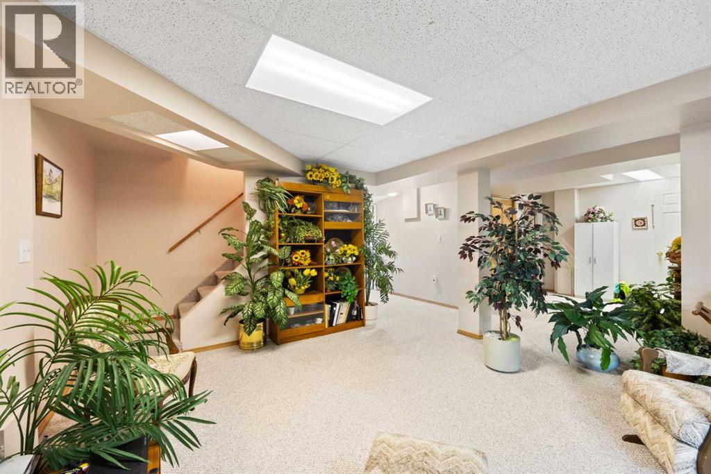 Single Family House Bungalow for Sale in  Arbour Cliff Close NW Arbour Lake Calgary 