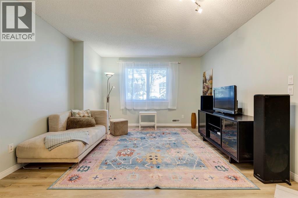 Single Family House 3 Level for Sale in  Sunlake Gardens SE Sundance Calgary 