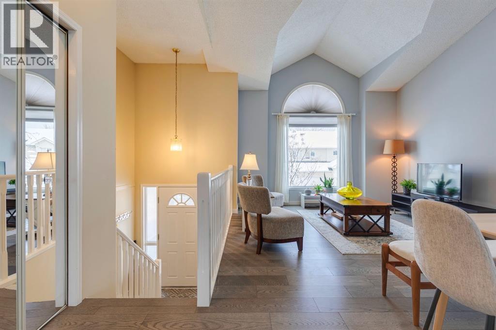 Single Family House 3 Level for Sale in  Sunlake Gardens SE Sundance Calgary 