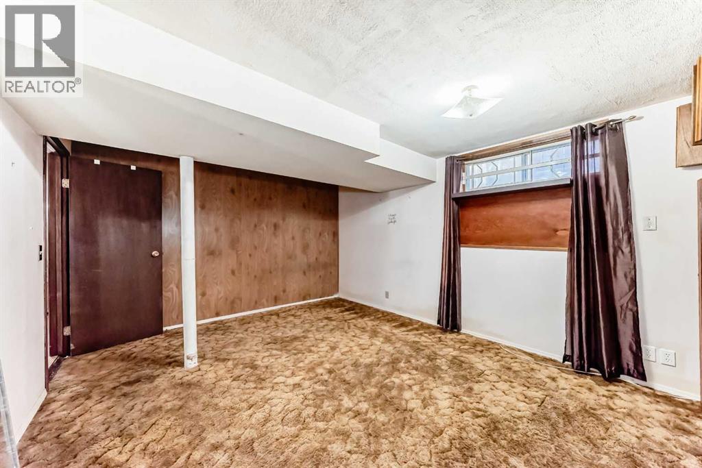 Single Family House Bungalow for Sale in  Dalrymple Crescent NW Dalhousie Calgary 