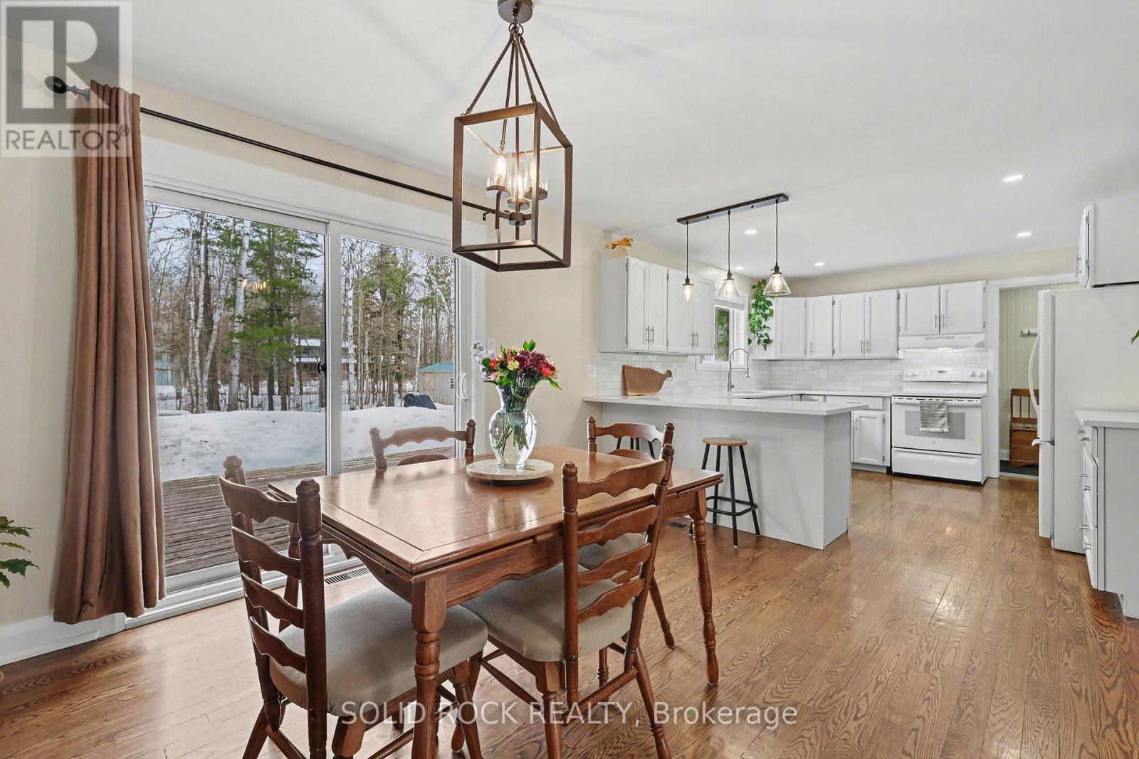 Open concept kitchen w/ breakfast bar.