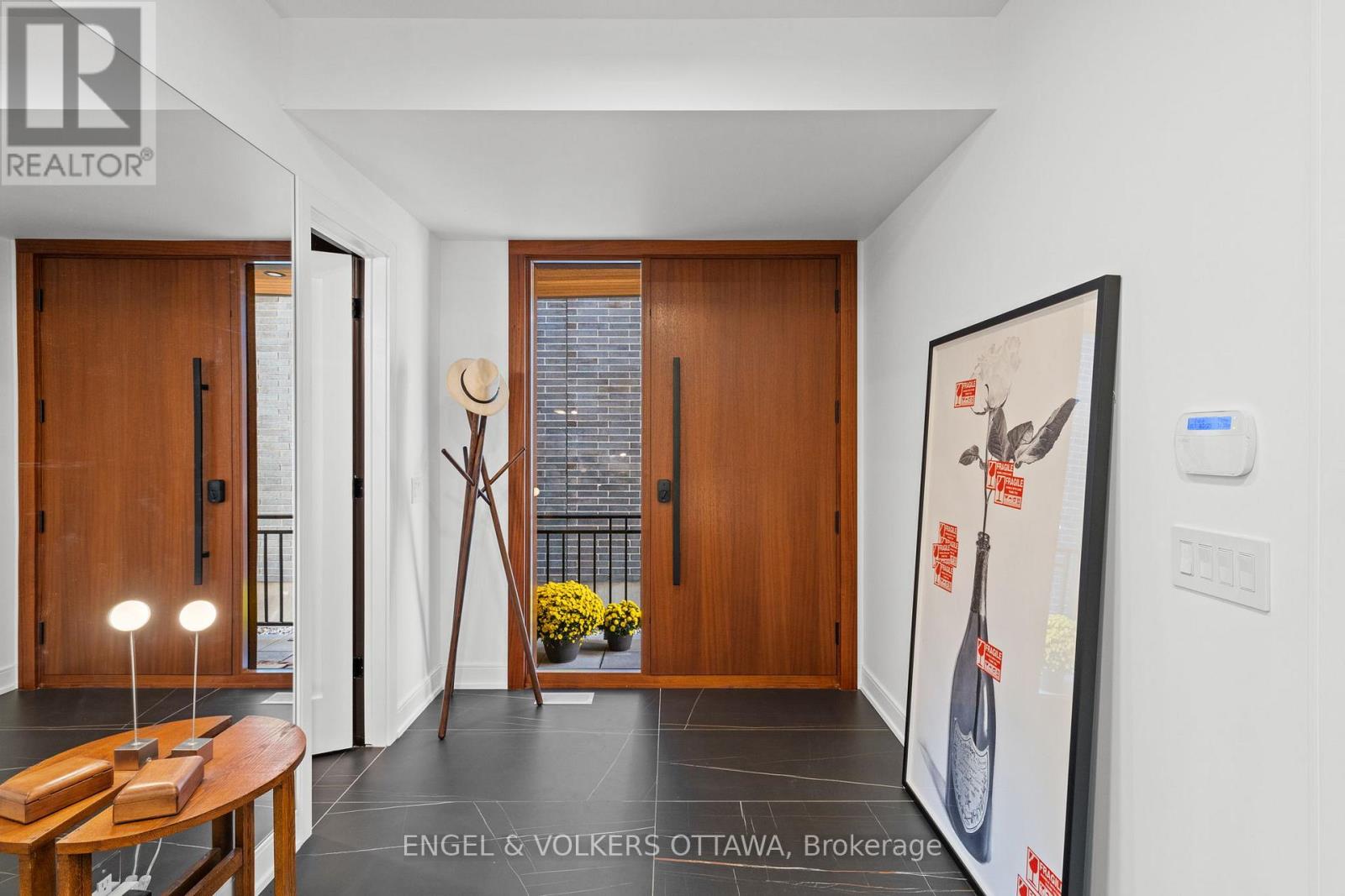 Stylish foyer with powder room.