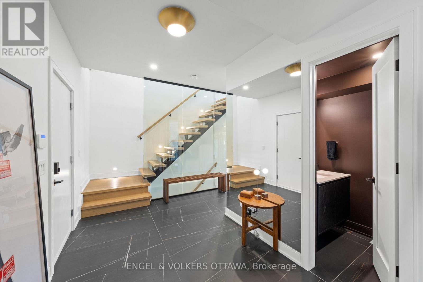 Built-in wall mirror & access to double car garage