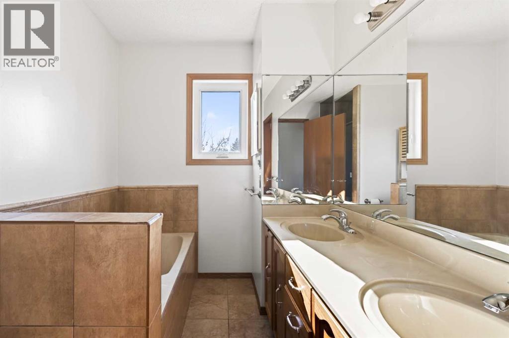 Single Family House 4 Level for Sale in  Riverbirch Place SE Riverbend Calgary 