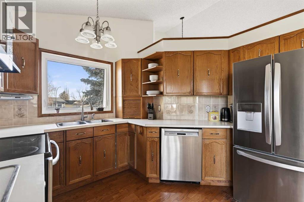 Single Family House 4 Level for Sale in  Riverbirch Place SE Riverbend Calgary 