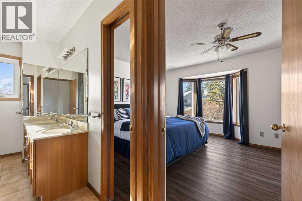 Single Family House 4 Level for Sale in  Riverbirch Place SE Riverbend Calgary 