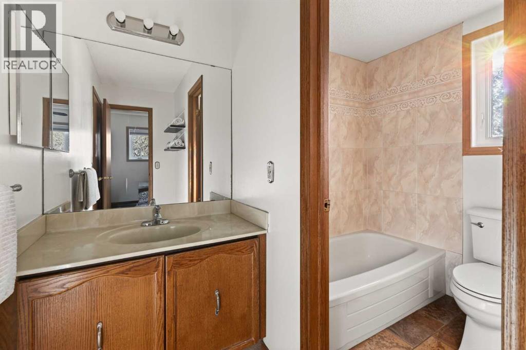 Single Family House 4 Level for Sale in  Riverbirch Place SE Riverbend Calgary 