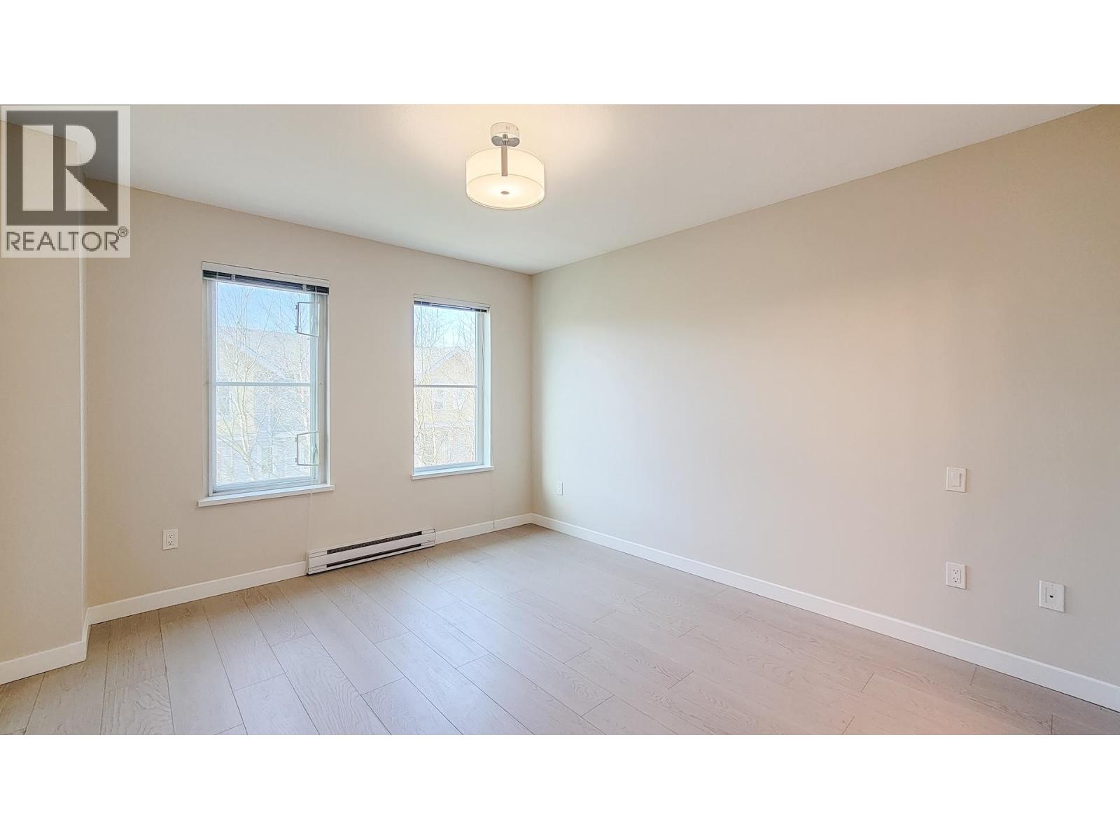 #100-5550 ADMIRAL Way, Delta