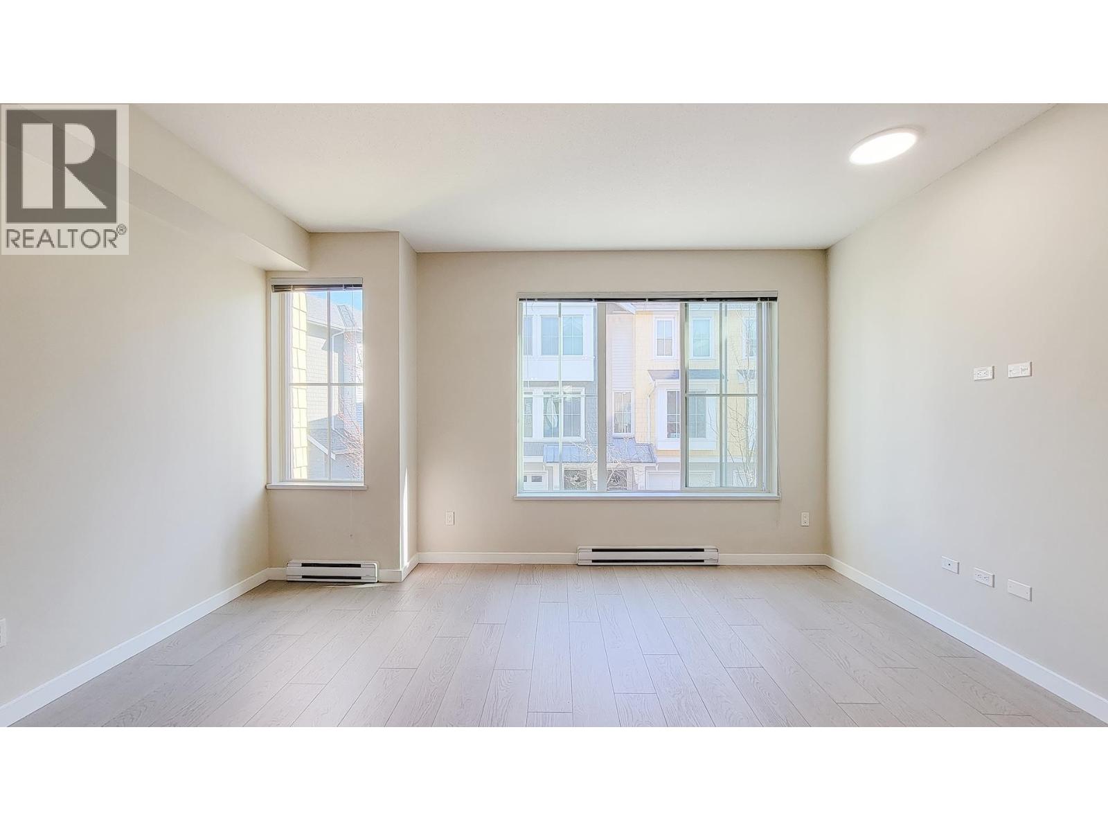 #100-5550 ADMIRAL Way, Delta