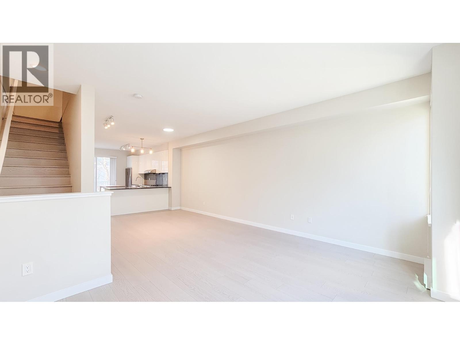 #100-5550 ADMIRAL Way, Delta