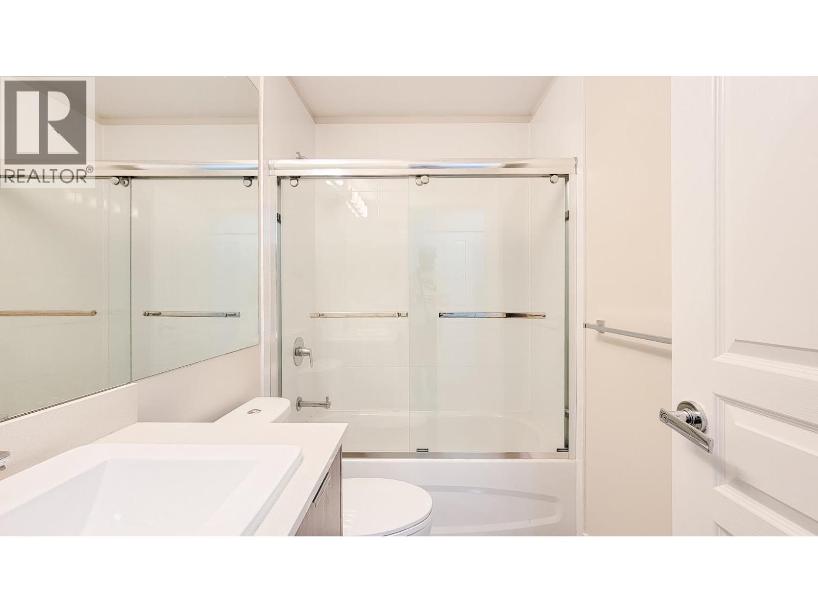 #100-5550 ADMIRAL Way, Delta