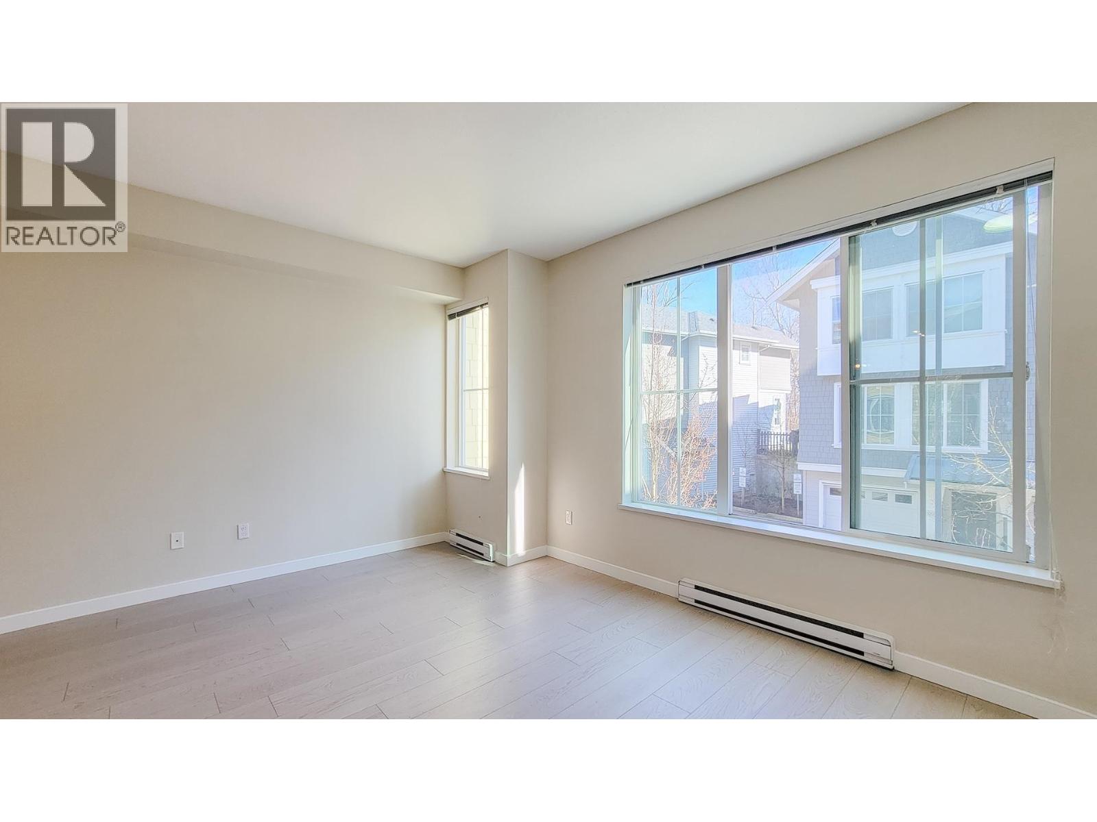 #100-5550 ADMIRAL Way, Delta