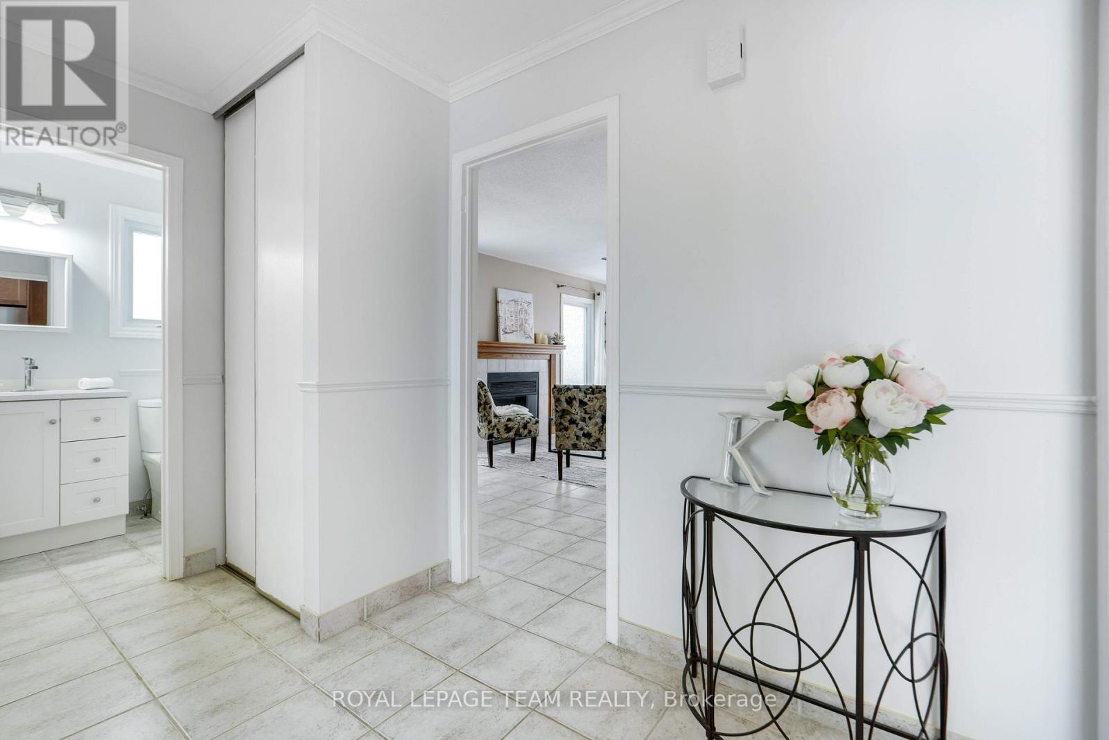 The welcoming front foyer. Also door from garage.