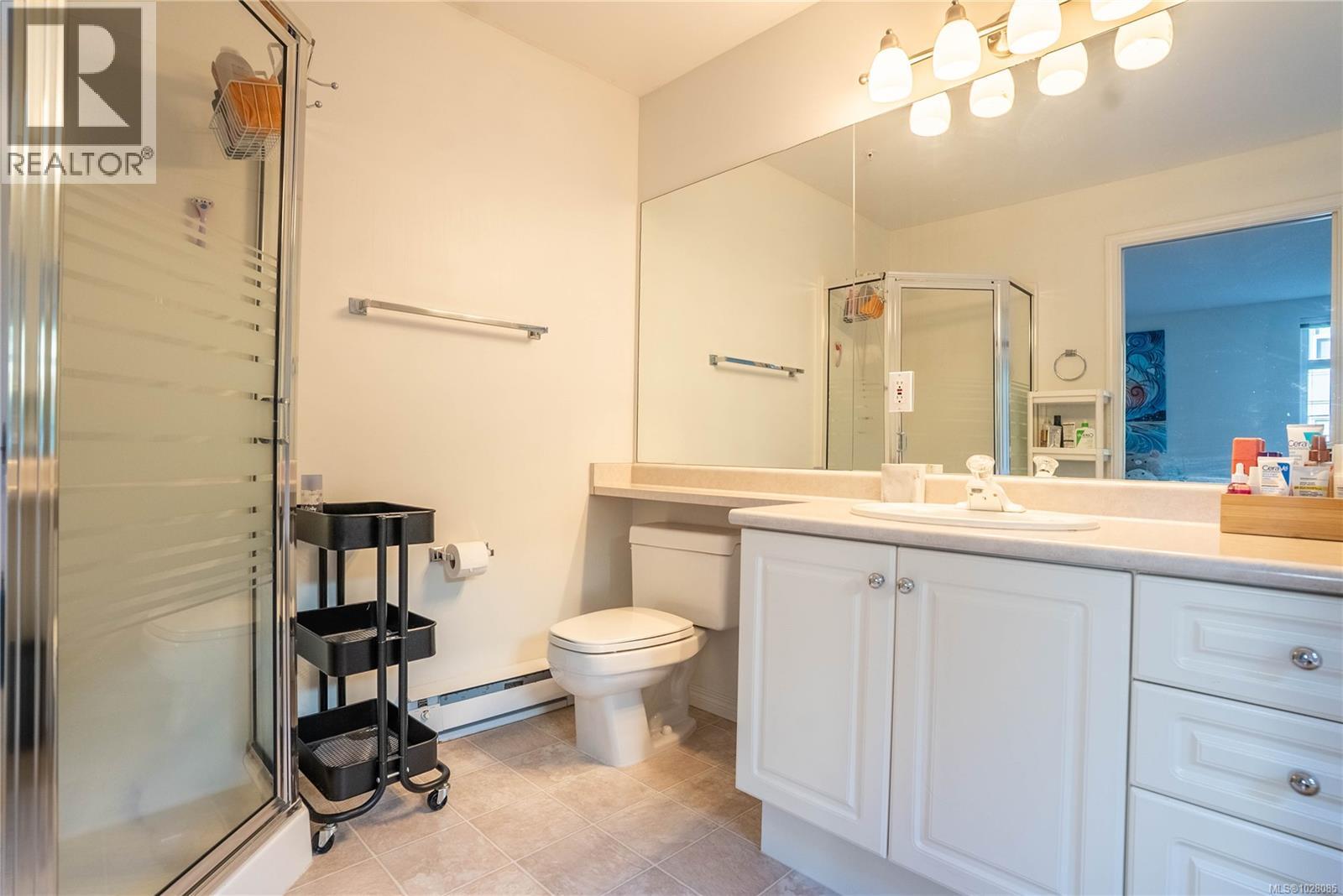 #306 5110 CORDOVA BAY RD - 34