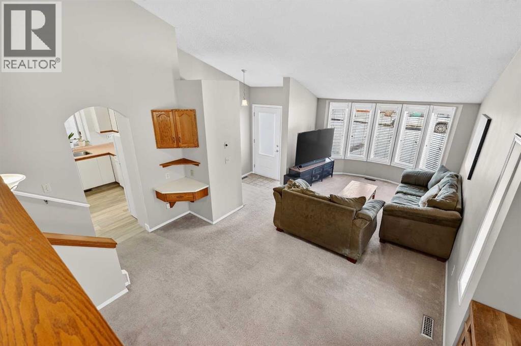 Single Family House 4 Level for Sale in  Deersaxon Circle SE Deer Run Calgary 