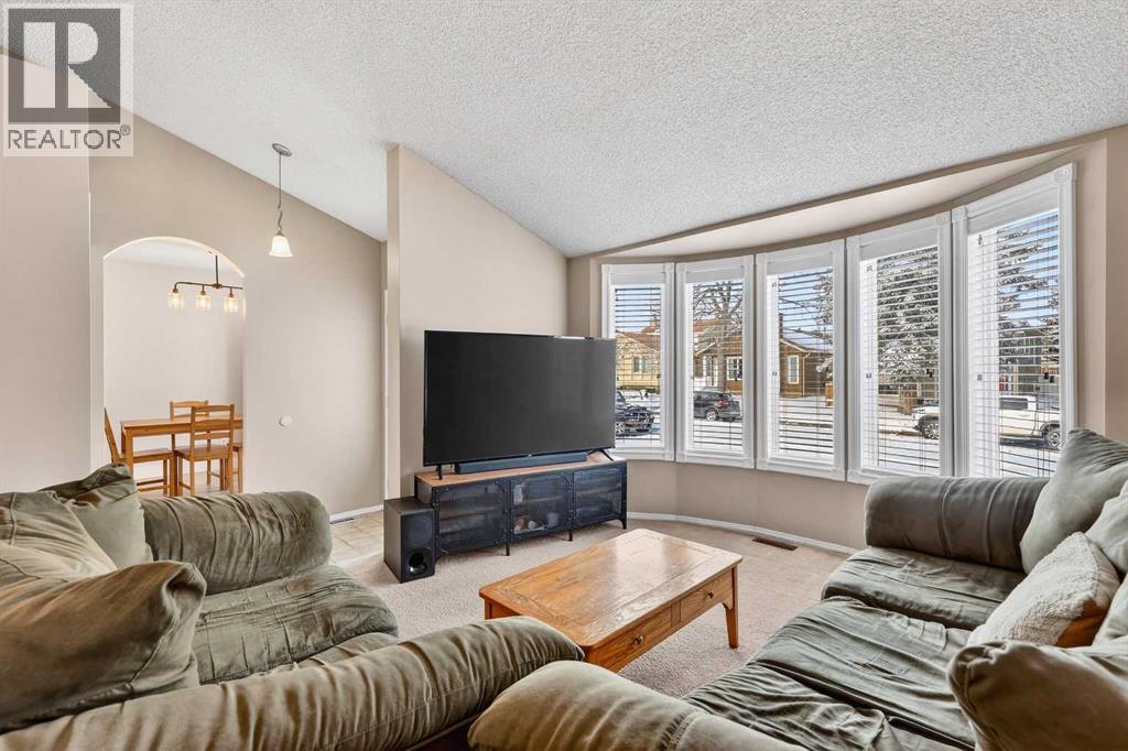 Single Family House 4 Level for Sale in  Deersaxon Circle SE Deer Run Calgary 