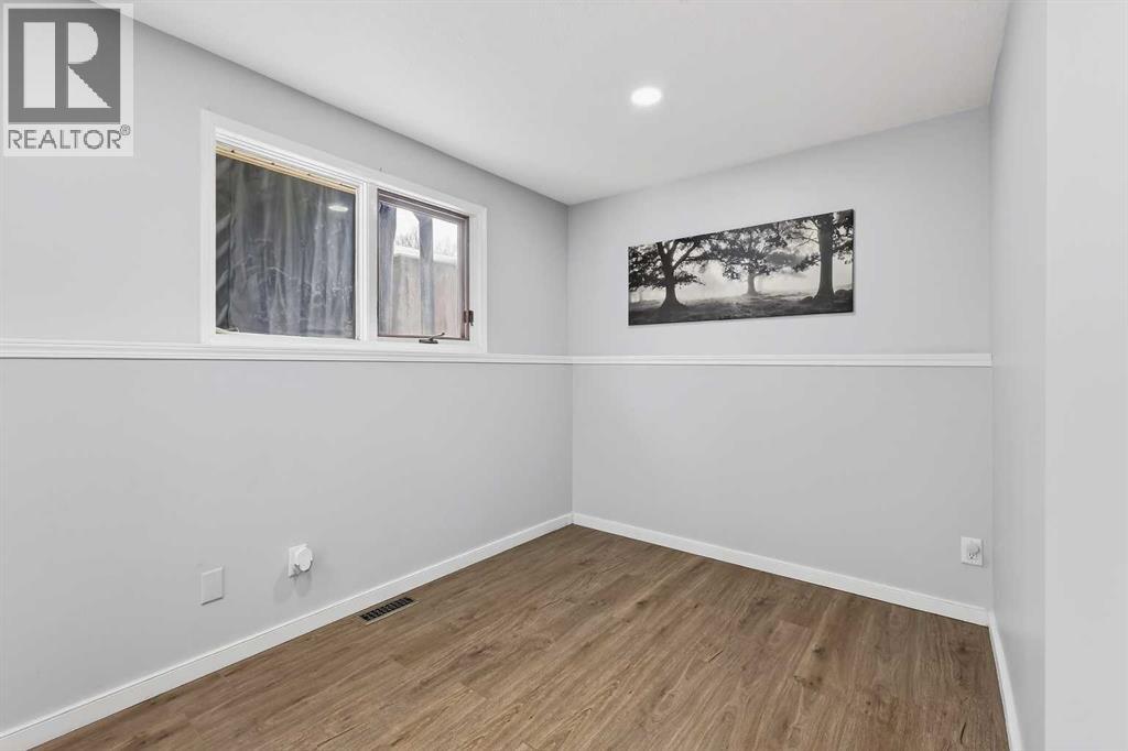 Single Family House 4 Level for Sale in  Deersaxon Circle SE Deer Run Calgary 