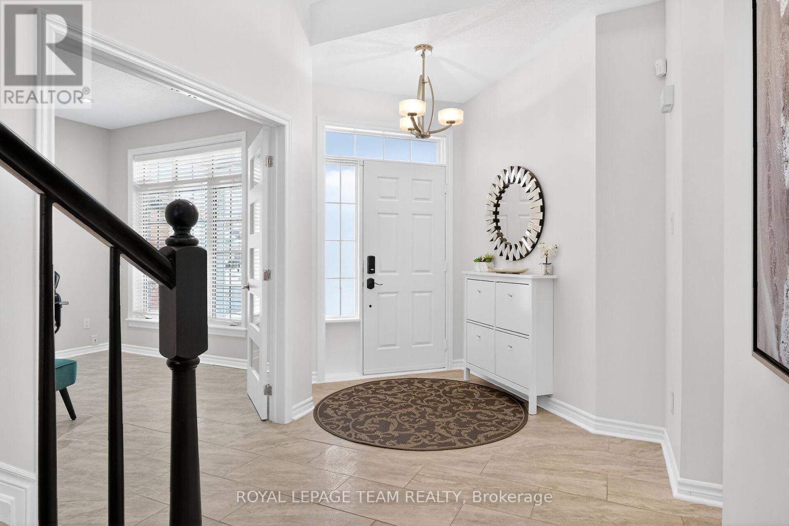 Spacious foyer with office access