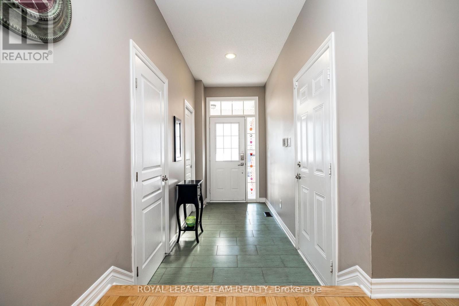 Foyer with door to walk in closet