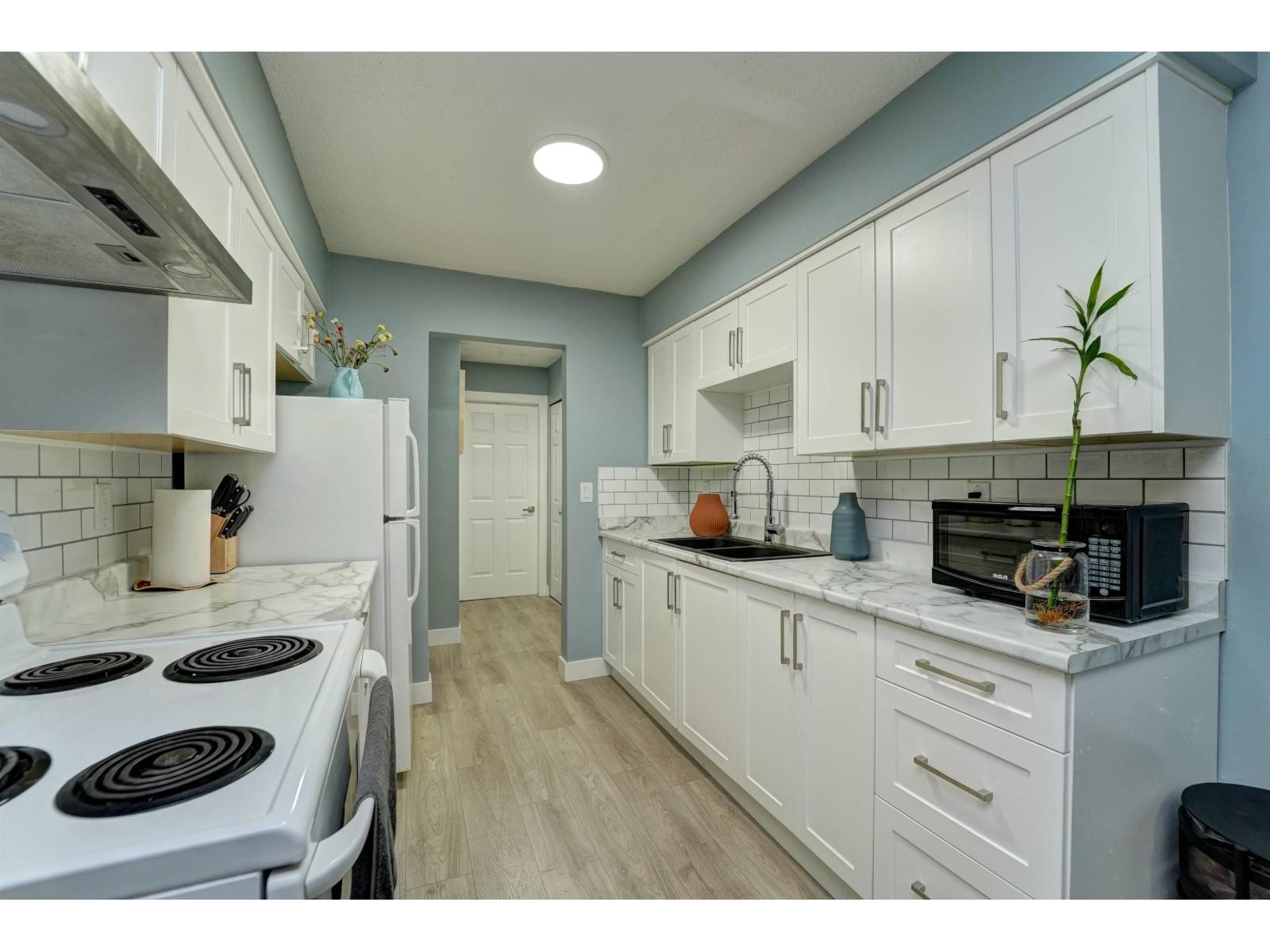 202 33450 GEORGE FERGUSON WAY, Abbotsford