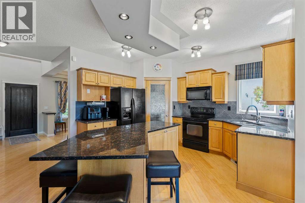 Single Family House for Sale in  Simcoe Crescent SW Signal Hill Calgary 