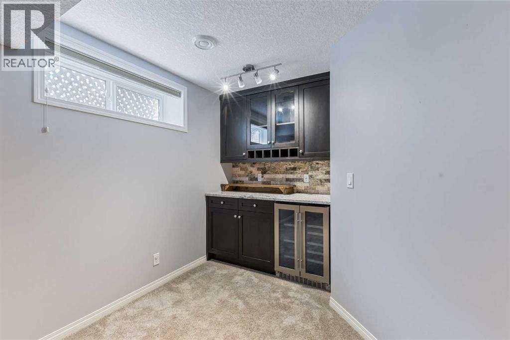 Single Family House for Sale in  Simcoe Crescent SW Signal Hill Calgary 