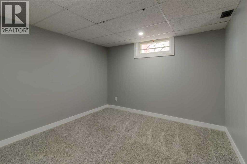 Single Family House Bungalow for Sale in   Street S Glendale Lethbridge 