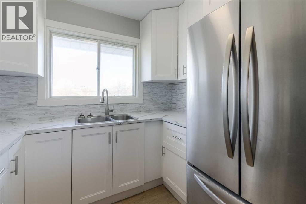 Single Family House Bungalow for Sale in   Street S Glendale Lethbridge 