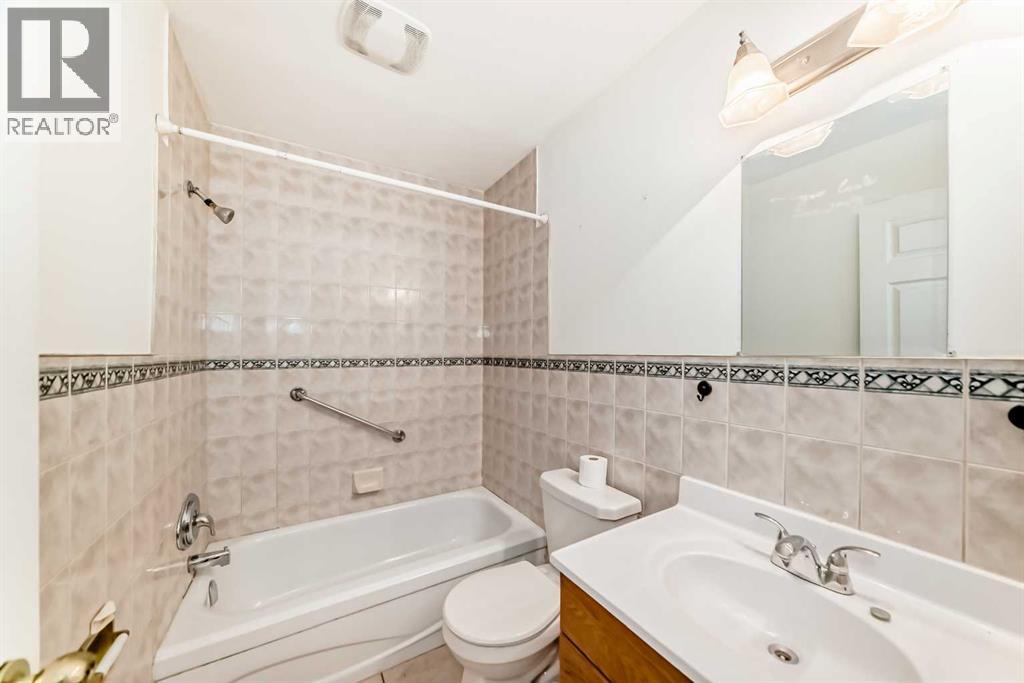 Single Family House 3 Level for Sale in  Midridge Drive SE Midnapore Calgary 