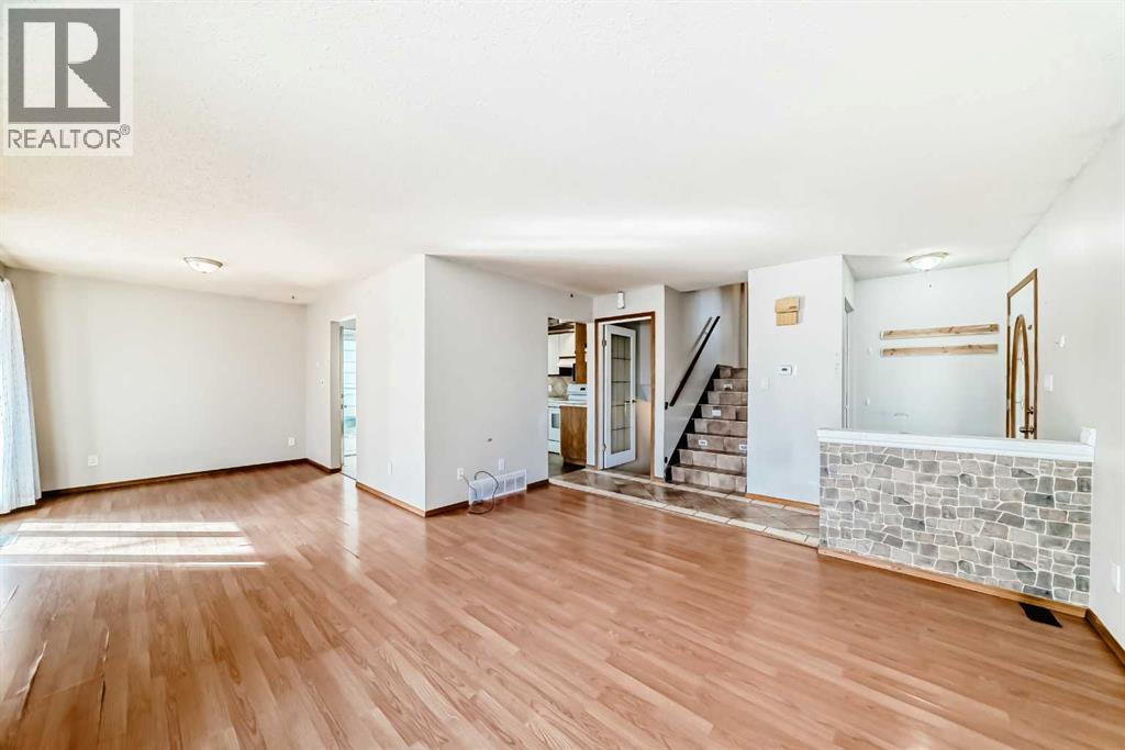 Single Family House 3 Level for Sale in  Midridge Drive SE Midnapore Calgary 