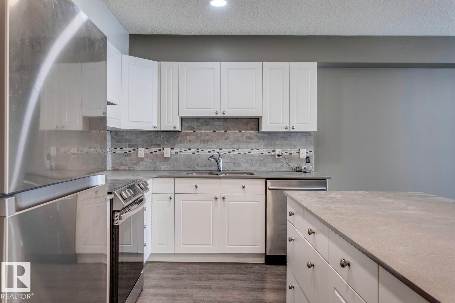 #300 10311 111 ST NW - 4