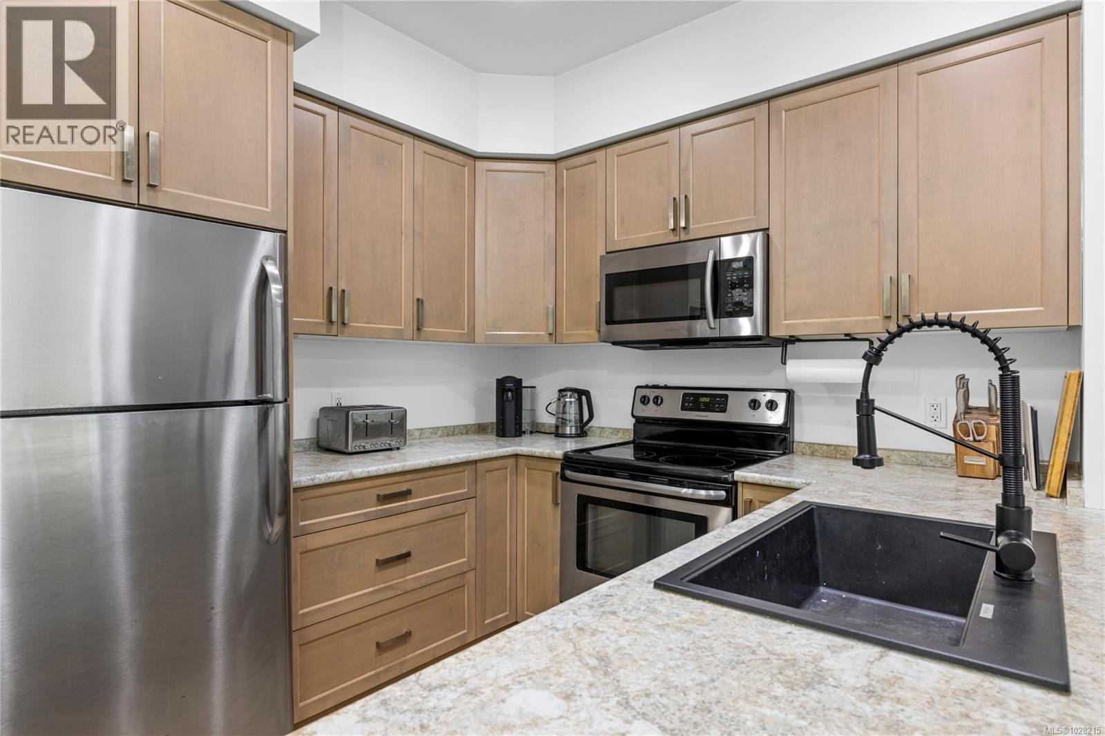 #117 4960 SONGBIRD PL - Image 3