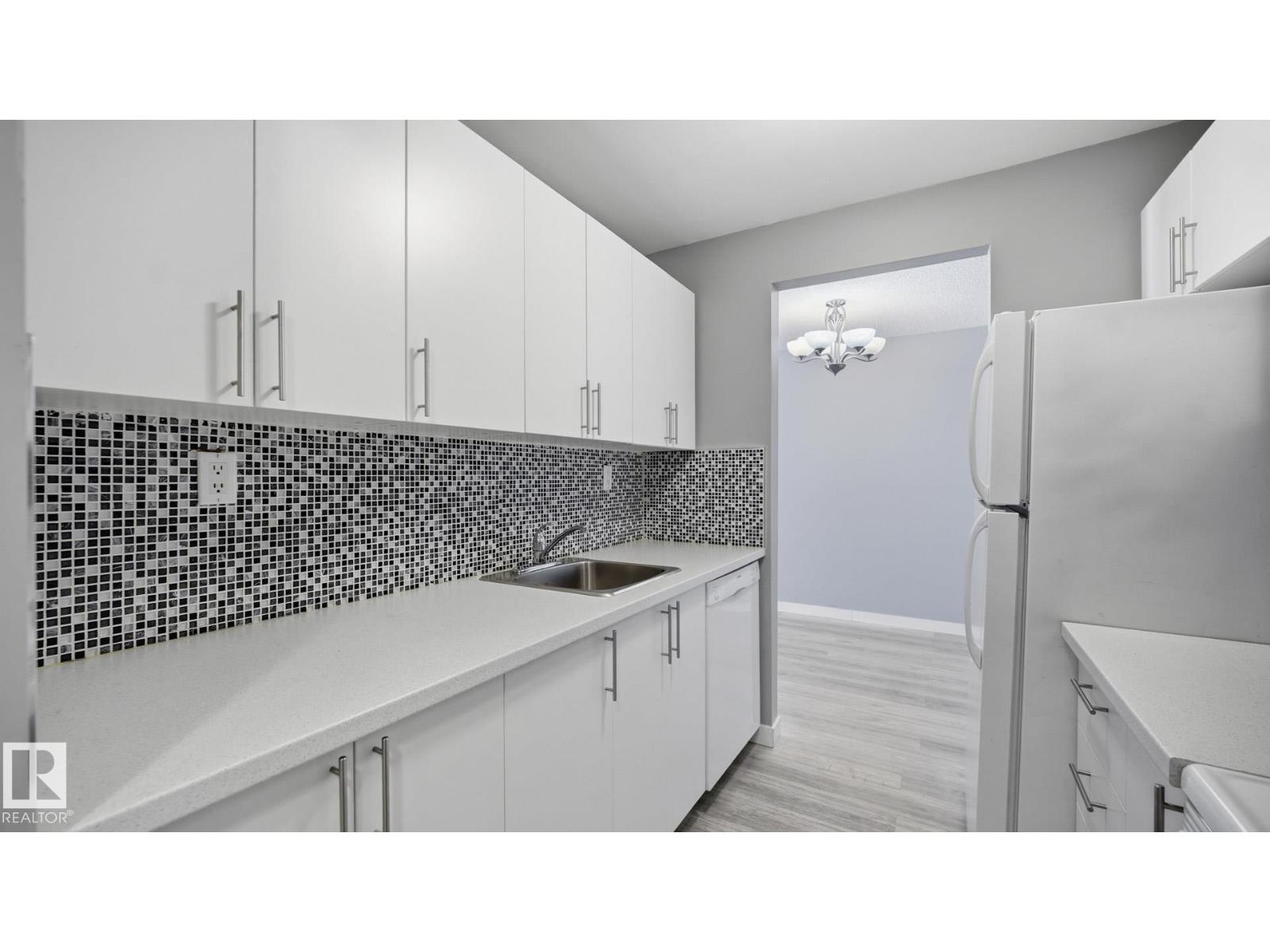 #103 1624 48 ST NW - 8