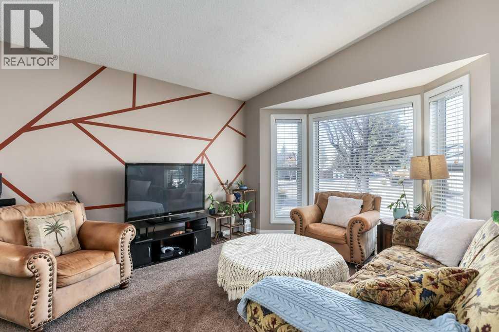 Single Family House Bi-level for Sale in  Shawfield Way SW Shawnessy Calgary 