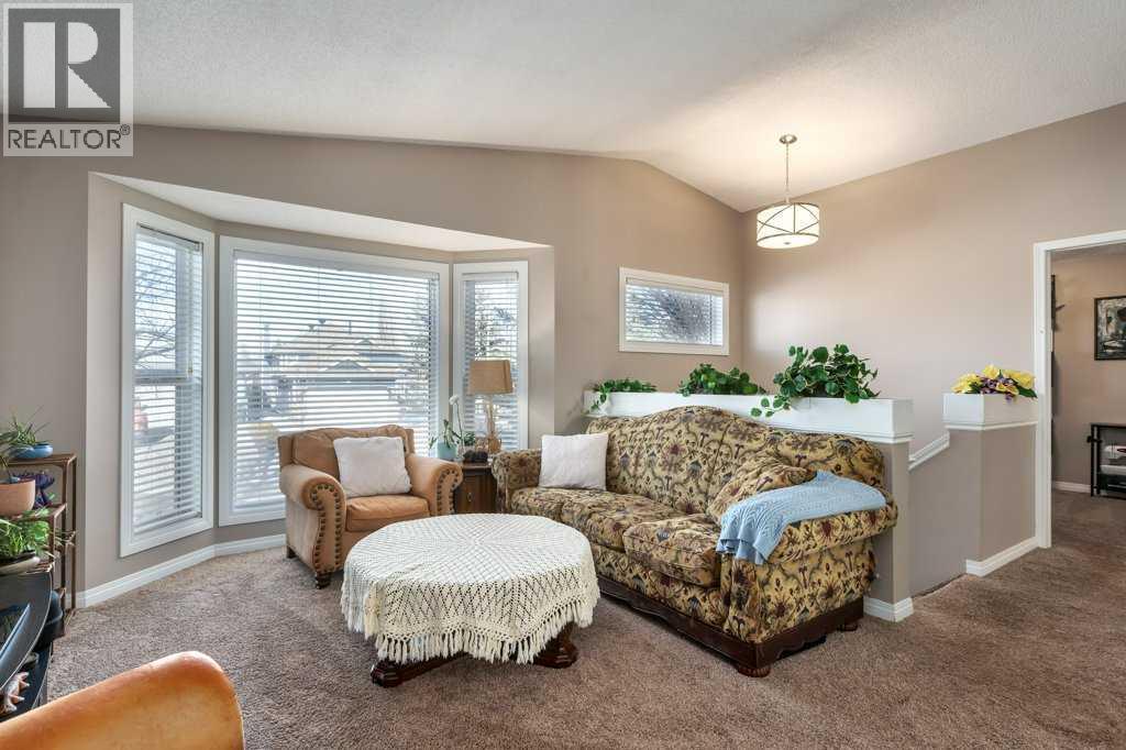 Single Family House Bi-level for Sale in  Shawfield Way SW Shawnessy Calgary 
